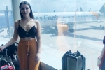 Passenger of Thomas Cook Airlines, Thomas Cook Airlines appropriate attire policy, 21 year old woman passenger of thomas cook airlines ordered to cover up crop top or else removed from flight, Emily